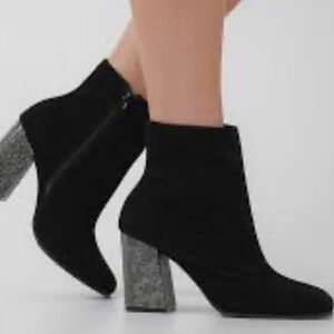 Chic Black Heeled Boots with Glittering Silver Heel